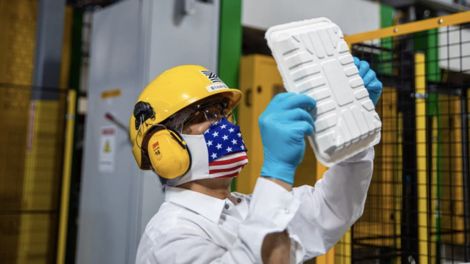 Man inspects food packaging