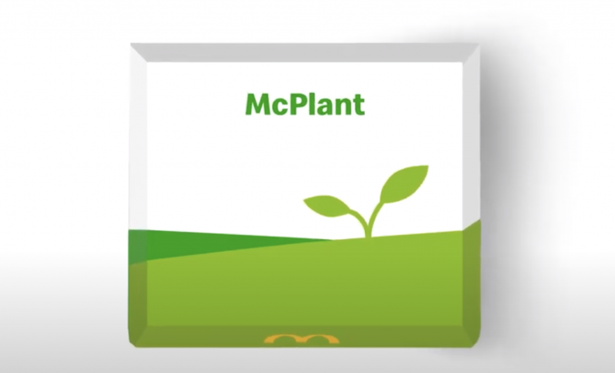 印有植物插图的食品包装盒，上面写着“McPlant”。