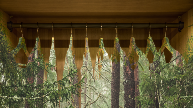 clothing on a rack with forest pattern