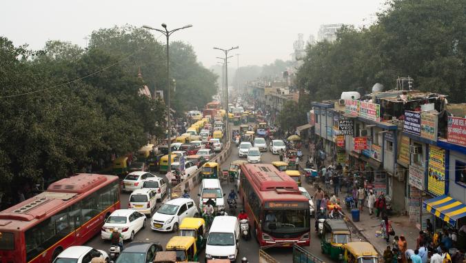 A photograph of a traffic jam in New Delhi, India