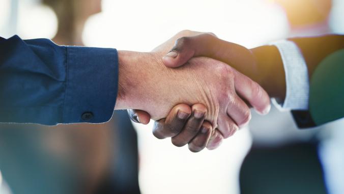 Handshake representing business deal